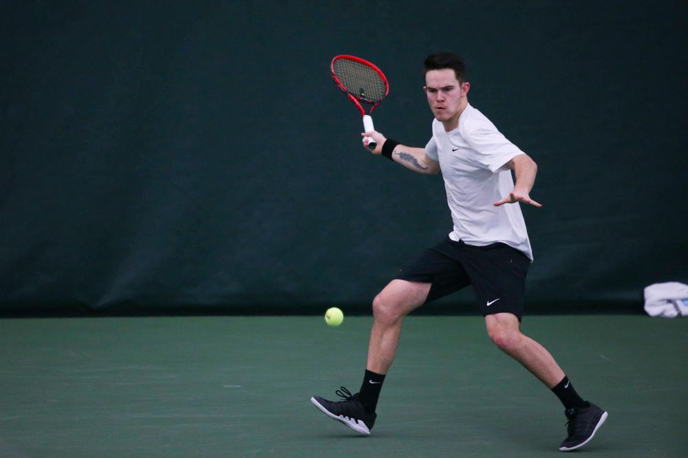Iowa's Jonas Larsen at a tennis match vs Drake Friday, March 8, 2019 at the Hawkeye Tennis and Recreation Complex. (Lily Smith/hawkeyesports.com)