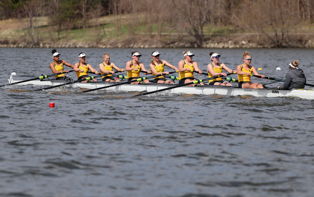 Iowa's Naomi Visser (from left), Elena Waiglein, Paige Schlapkohl, Hannah Greenlee, Hunter Koenigsfeld, Contessa Harold, Katie Pearson, Eve Stewart, and Logan Jones during their 1 Varsity 8 race against Wisconsin in their Big Ten Double Dual Rowing Regatta at Lake Macbride in Solon on Saturday, Apr. 13, 2019. (Stephen Mally/hawkeyesports.com)