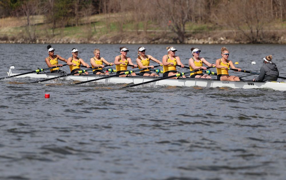 Iowa's Naomi Visser (from left), Elena Waiglein, Paige Schlapkohl, Hannah Greenlee, Hunter Koenigsfeld, Contessa Harold, Katie Pearson, Eve Stewart, and Logan Jones during their 1 Varsity 8 race against Wisconsin in their Big Ten Double Dual Rowing Regatta at Lake Macbride in Solon on Saturday, Apr. 13, 2019. (Stephen Mally/hawkeyesports.com)