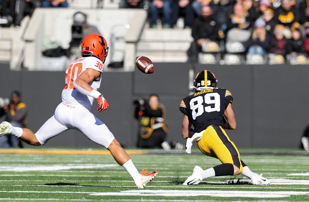Iowa Hawkeyes wide receiver Nico Ragaini (89) pulls in a pass for a first down during the first quarter of their game at Kinnick Stadium in Iowa City on Saturday, Nov 23, 2019. (Stephen Mally/hawkeyesports.com)