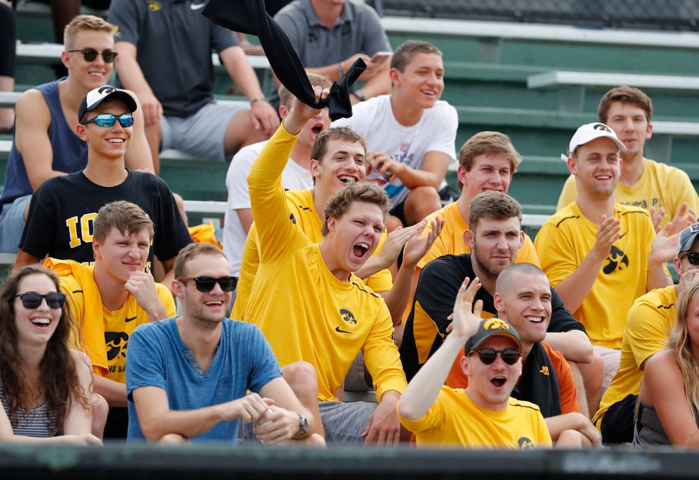 Members of the swimming and diving team cheer during the Iowa Student Athlete Kickoff Kickball game Sunday, August 19, 2018 at Duane Banks Field. (Brian Ray/hawkeyesports.com)