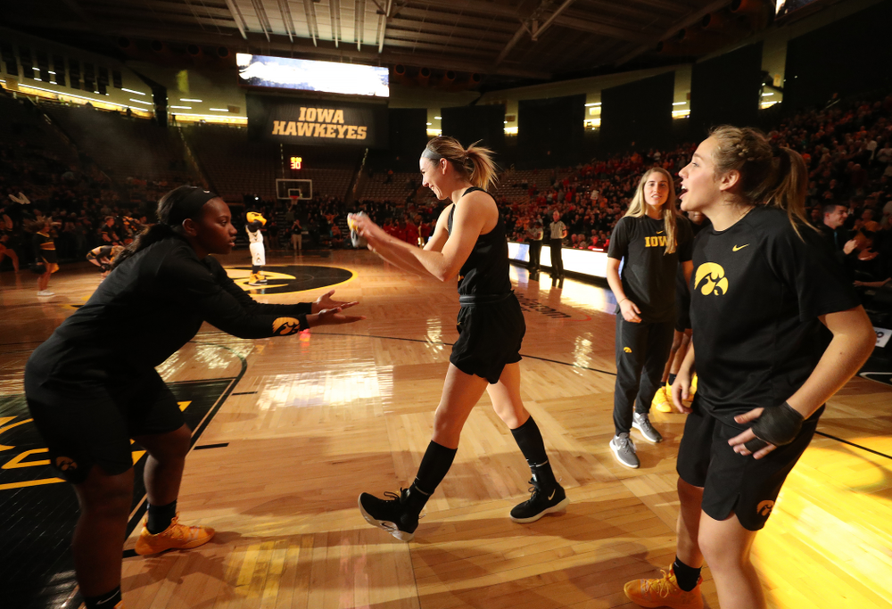 Iowa Hawkeyes forward Hannah Stewart (21) and guard Alexis Sevillian (5) against the Iowa State Cyclones in the Iowa Corn Cy-Hawk Series Wednesday, December 5, 2018 at Carver-Hawkeye Arena. (Brian Ray/hawkeyesports.com)