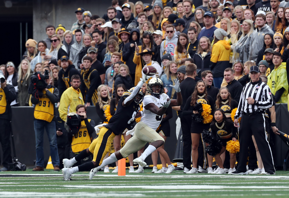 Iowa Hawkeyes defensive back Matt Hankins (8) breaks up a pass against the Purdue Boilermakers Saturday, October 19, 2019 at Kinnick Stadium. (Brian Ray/hawkeyesports.com)