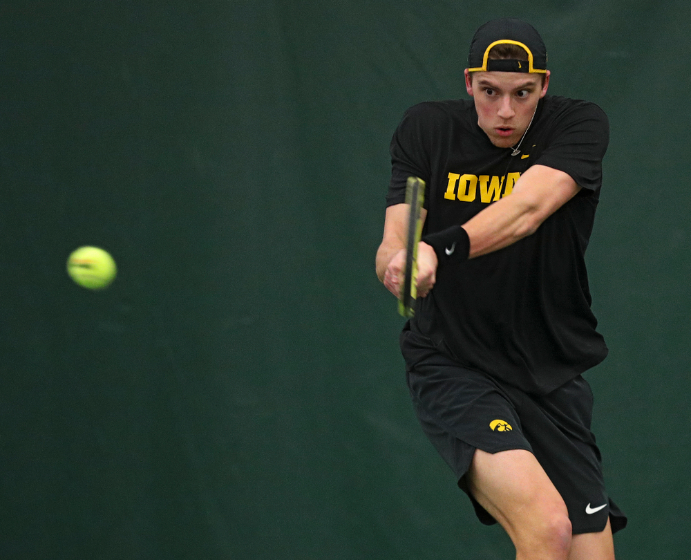 Iowa’s Joe Tyler returns a shot during his singles match at the Hawkeye Tennis and Recreation Complex in Iowa City on Friday, March 6, 2020. (Stephen Mally/hawkeyesports.com)
