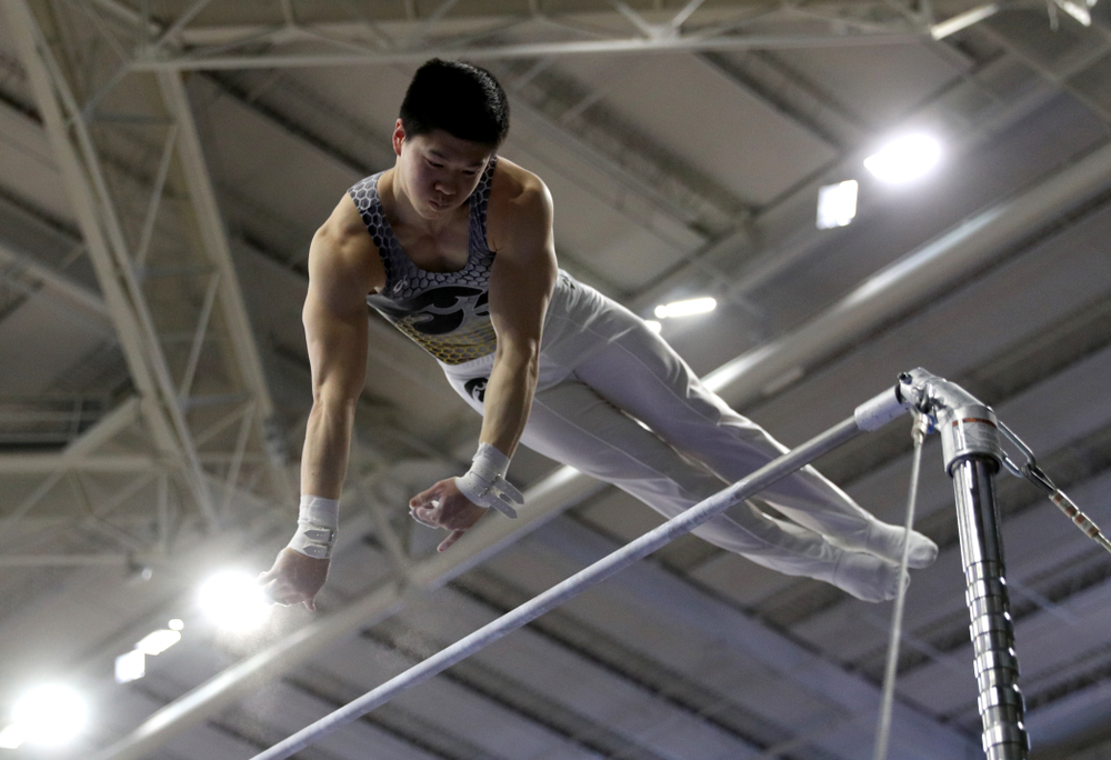 Iowa’s Bennet Huang competes on the high bar against UIC and Minnesota Saturday, February 1, 2020 at Carver-Hawkeye Arena. (Brian Ray/hawkeyesports.com)