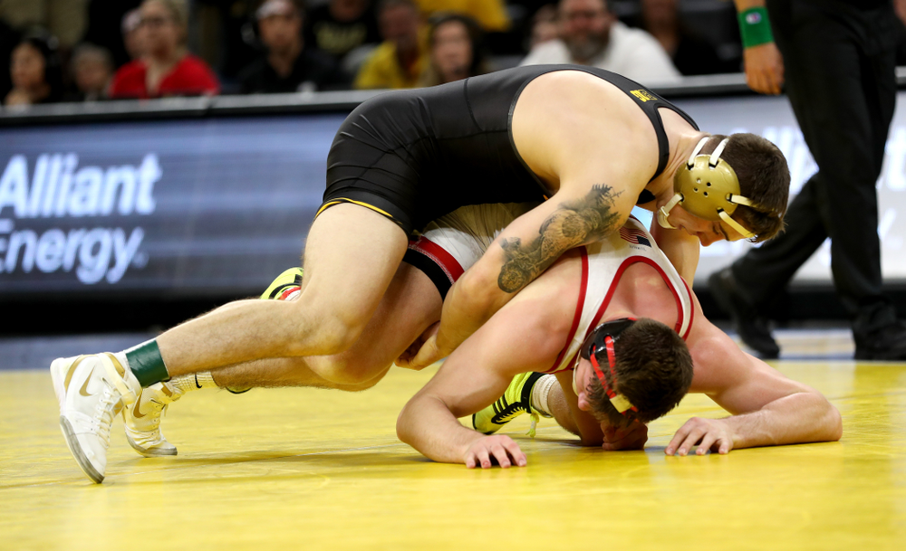 Iowa’s Abe Assad wrestles Nebraska’s Taylor Venz at 184 pounds Saturday, January 18, 2020 at Carver-Hawkeye Arena. Assad won the match 6-4. (Brian Ray/hawkeyesports.com)