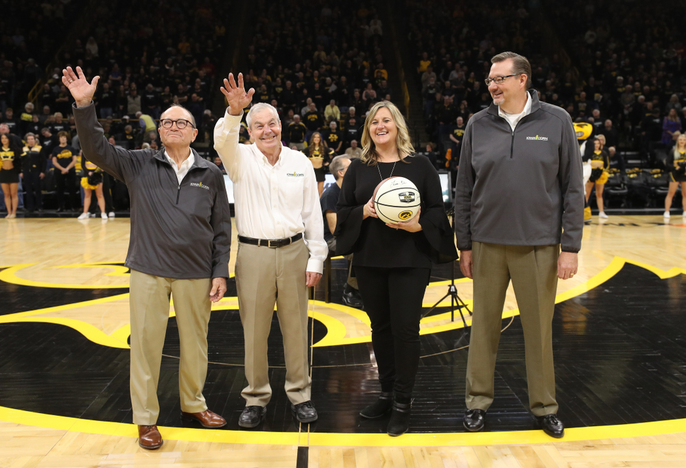 Iowa Corn is presented a signed ball before the Iowa Hawkeyes game against the Iowa State Cyclones in the Iowa Corn Cy-Hawk Series Wednesday, December 5, 2018 at Carver-Hawkeye Arena. (Brian Ray/hawkeyesports.com)