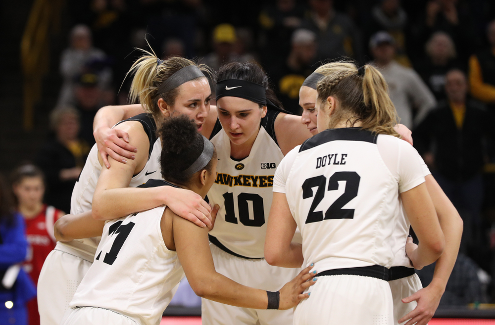 Iowa Hawkeyes forward Hannah Stewart (21), guard Tania Davis (11), forward Megan Gustafson (10), guard Makenzie Meyer (3), and guard Kathleen Doyle (22) against the Rutgers Scarlet Knights Wednesday, January 23, 2019 at Carver-Hawkeye Arena. (Brian Ray/hawkeyesports.com)