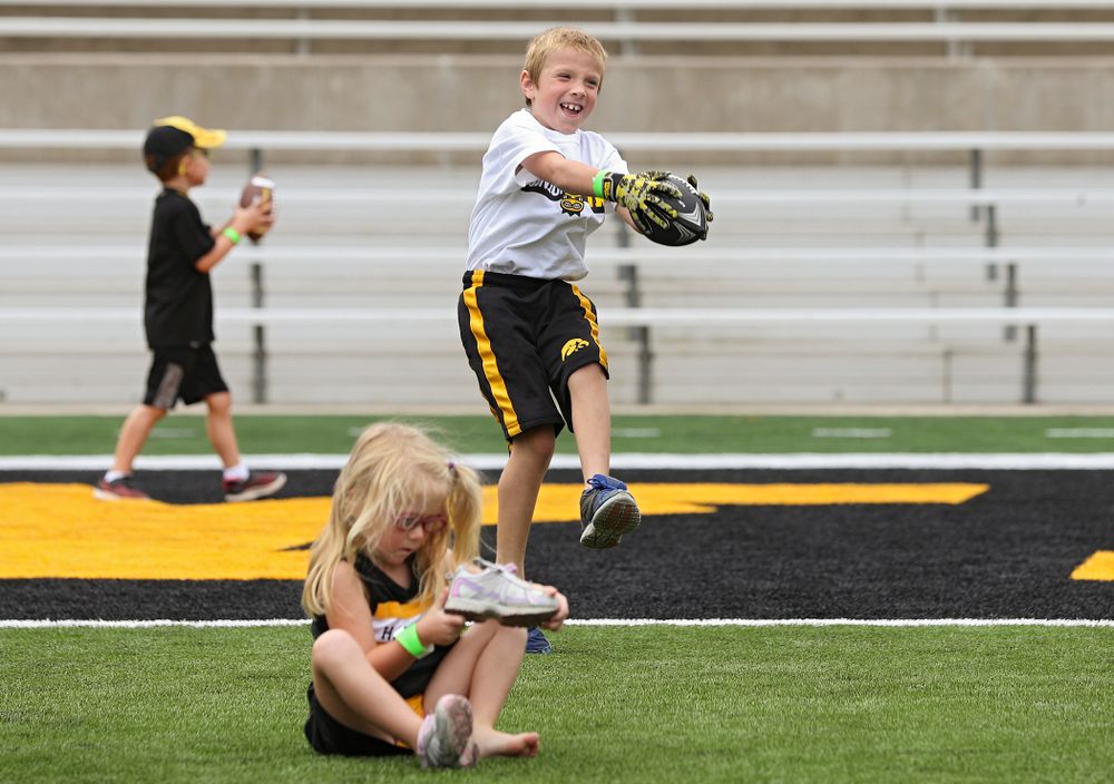 Junior Hawk Club members participate in the Swarm Experience during Kids Day at Kinnick Stadium in Iowa City on Saturday, Aug 10, 2019. (Stephen Mally/hawkeyesports.com)