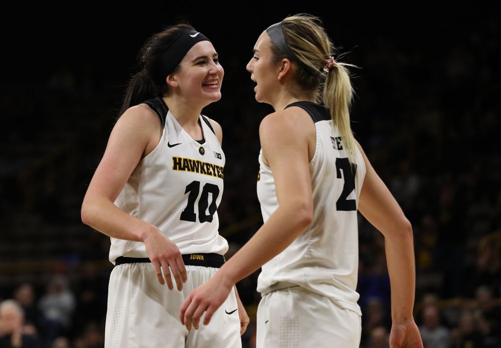 Iowa Hawkeyes forward Megan Gustafson (10) and forward Hannah Stewart (21) against the Michigan Wolverines Thursday, January 17, 2019 at Carver-Hawkeye Arena. (Brian Ray/hawkeyesports.com)