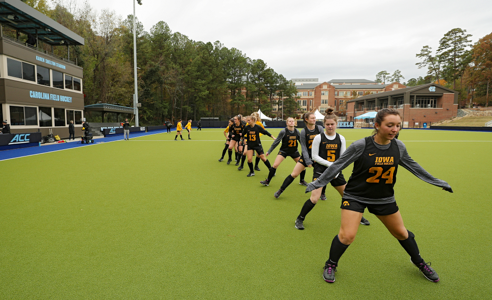 The Iowa Hawkeyes warm up for their practice at Karen Shelton Stadium in Chapel Hill, N.C. on Thursday, Nov 14, 2019. (Stephen Mally/hawkeyesports.com)