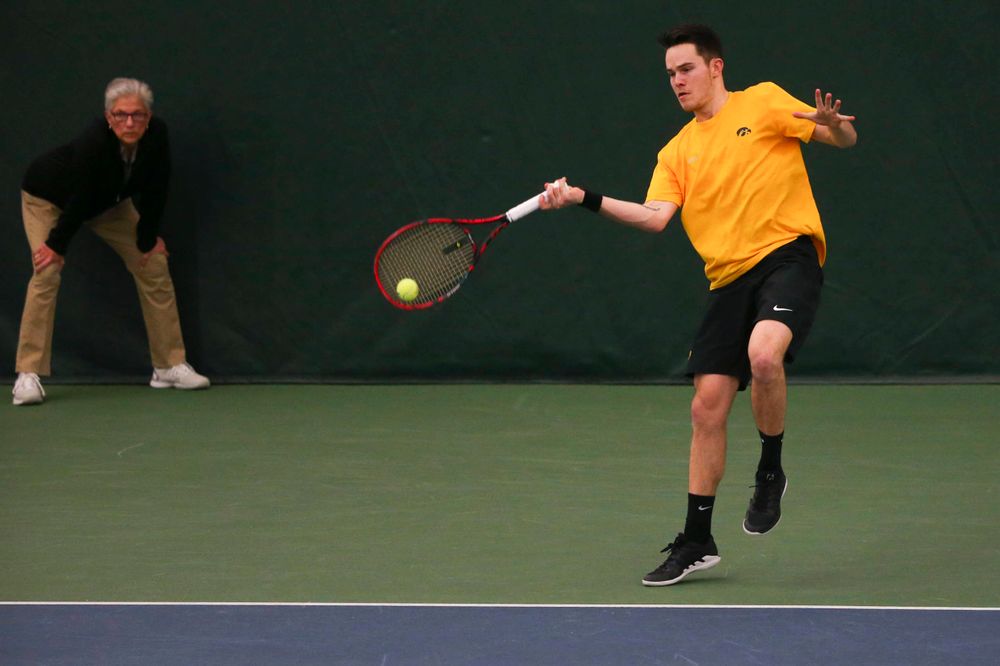 Iowa's Jonas Larsen at a tennis match vs Drake Friday, March 8, 2019 at the Hawkeye Tennis and Recreation Complex. (Lily Smith/hawkeyesports.com)