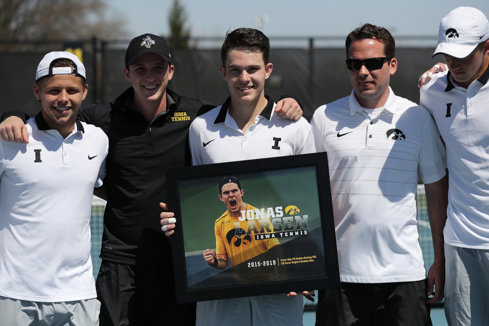 IowaÕs Jonas Larsen is honored during senior day ceremonies before their game against the Michigan Wolverines Sunday, April 21, 2019 at the Hawkeye Tennis and Recreation Complex. (Brian Ray/hawkeyesports.com)