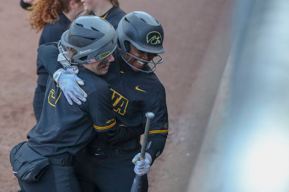 IowaÕs Donirae Mayhew (24) and Iowa catcher Abby Lien (9) at softball vs Illinois game 3 on Saturday, April 13, 2019 at Bob Pearl Field. (Lily Smith/hawkeyesports.com)