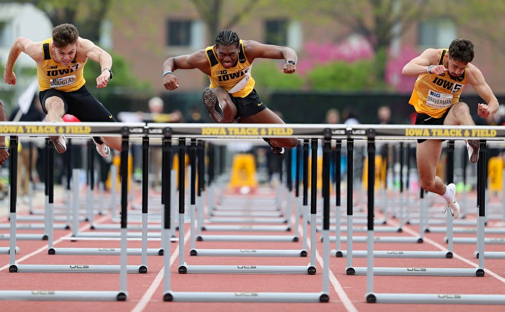 Iowa's Chris Douglas (from left), Anthony Williams, and Josh Braverman run the men’s 110 meter hurdles event on the third day of the Big Ten Outdoor Track and Field Championships at Francis X. Cretzmeyer Track in Iowa City on Sunday, May. 12, 2019. (Stephen Mally/hawkeyesports.com)