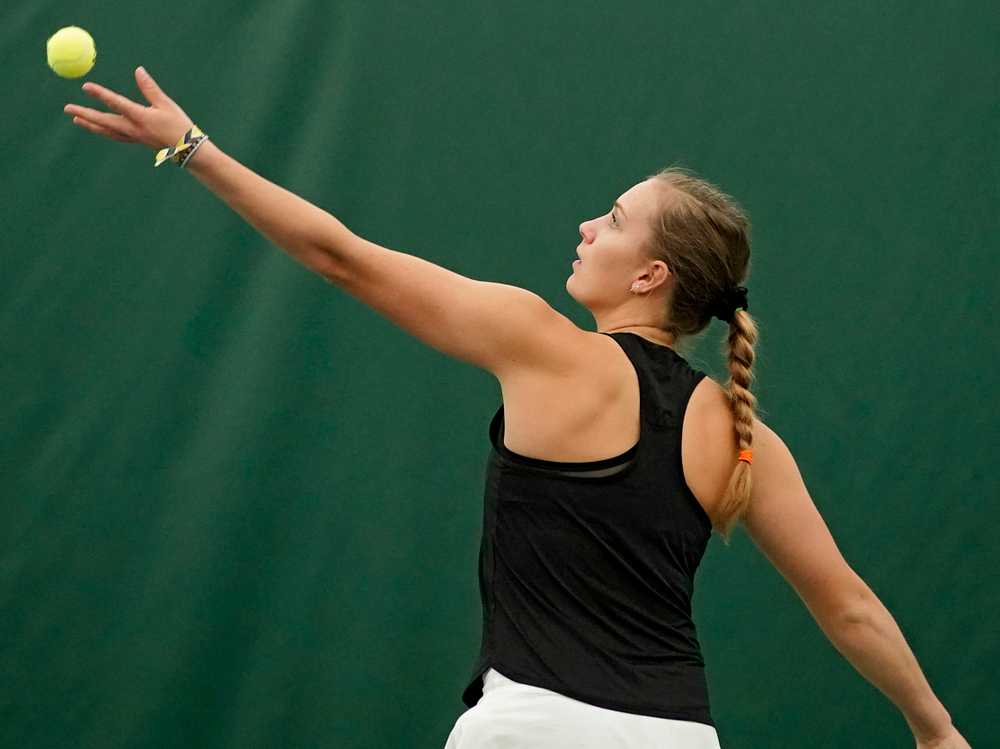 Iowa's Ashleigh Jacobs serves during their doubles match against Indiana at the Hawkeye Tennis and Recreation Complex in Iowa City on Sunday, Mar. 31, 2019. (Stephen Mally/hawkeyesports.com)