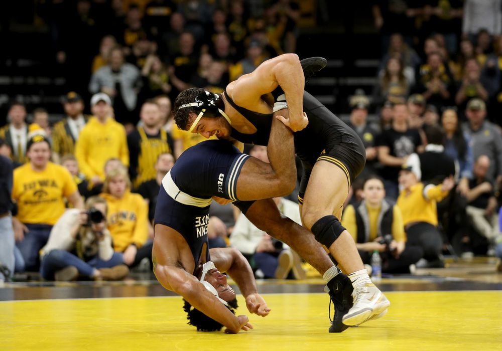 Iowa’s Michael Kemerer wrestles Penn State’s Mark Hall at 174 pounds Friday, January 31, 2020 at Carver-Hawkeye Arena. Kemerer won the match 11-6. (Brian Ray/hawkeyesports.com)