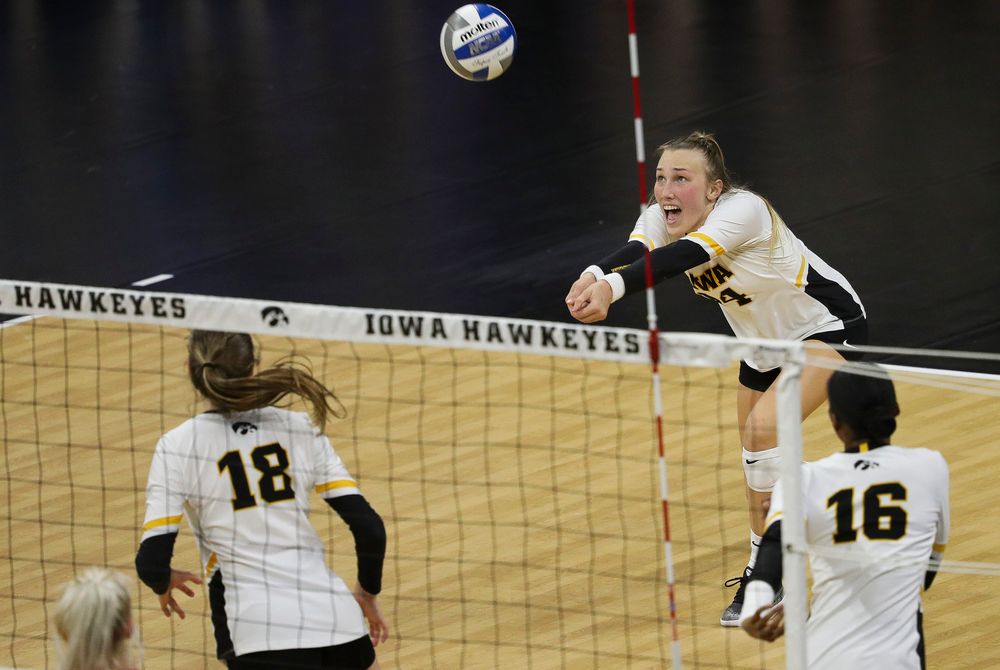 Iowa Hawkeyes outside hitter Cali Hoye (14) bumps the ball during a match against Rutgers at Carver-Hawkeye Arena on November 2, 2018. (Tork Mason/hawkeyesports.com)