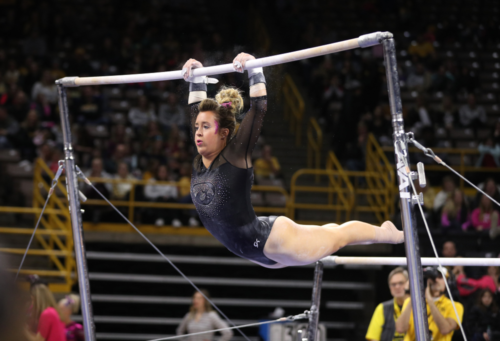 Iowa's Maddie Kampschroeder competes on the bars during their meet against the Minnesota Golden Gophers Saturday, January 19, 2019 at Carver-Hawkeye Arena. (Brian Ray/hawkeyesports.com)