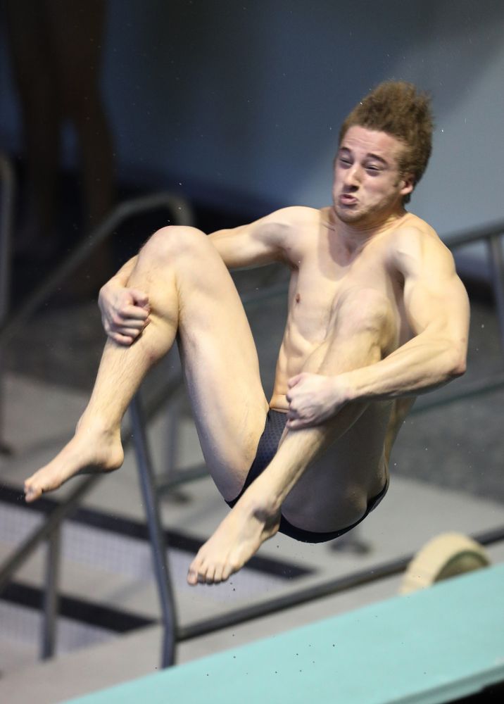 Iowa's Will Brenner competes on the 1 meter springboard during a double dual against Wisconsin and Northwestern Saturday, January 19, 2019 at the Campus Recreation and Wellness Center. (Brian Ray/hawkeyesports.com)
