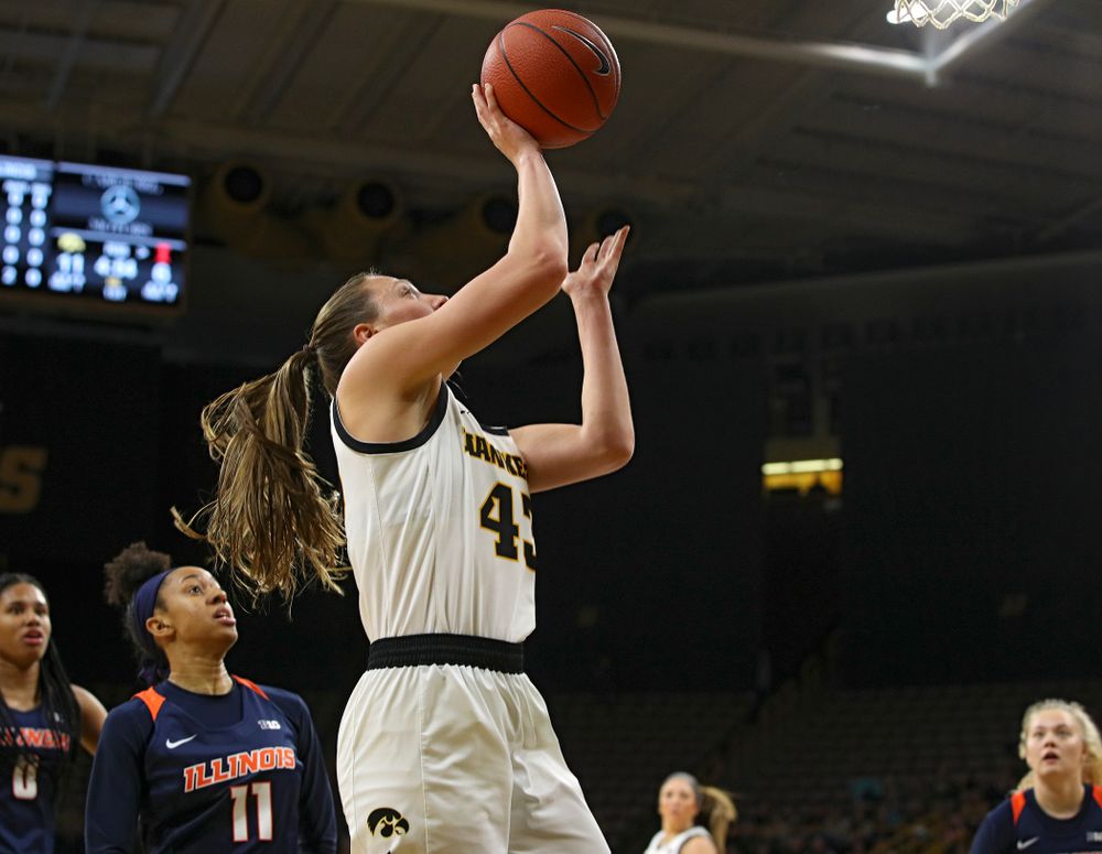 Iowa Hawkeyes forward Amanda Ollinger (43) scores a basket inside during the first quarter of their game at Carver-Hawkeye Arena in Iowa City on Tuesday, December 31, 2019. (Stephen Mally/hawkeyesports.com)