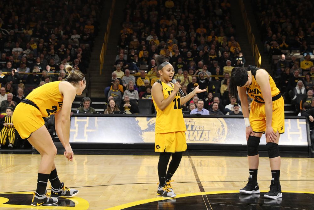 Iowa Hawkeyes forward Megan Gustafson (10), guard Tania Davis (11), and forward Hannah Stewart (21) during senior day ceremonies following their game against the Northwestern Wildcats Sunday, March 3, 2019 at Carver-Hawkeye Arena. (Brian Ray/hawkeyesports.com)