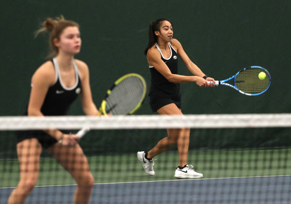 Iowa's Michelle Bacalla and Cloe Ruettte play a doubles match against the Penn State Nittany Lions Sunday, February 24, 2019 at the Hawkeye Tennis and Recreation Complex. (Brian Ray/hawkeyesports.com)