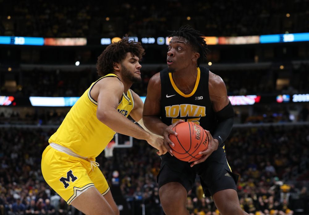 Iowa Hawkeyes forward Tyler Cook (25) against the Michigan Wolverines in the 2019 Big Ten Men's Basketball Tournament Friday, March 15, 2019 at the United Center in Chicago. (Brian Ray/hawkeyesports.com)