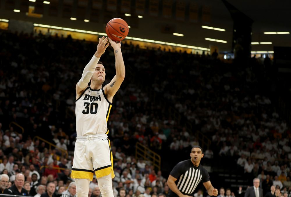 Iowa Hawkeyes guard Connor McCaffery (30) makes a three point basket against the Illinois Fighting Illini Sunday, February 2, 2020 at Carver-Hawkeye Arena. (Brian Ray/hawkeyesports.com)