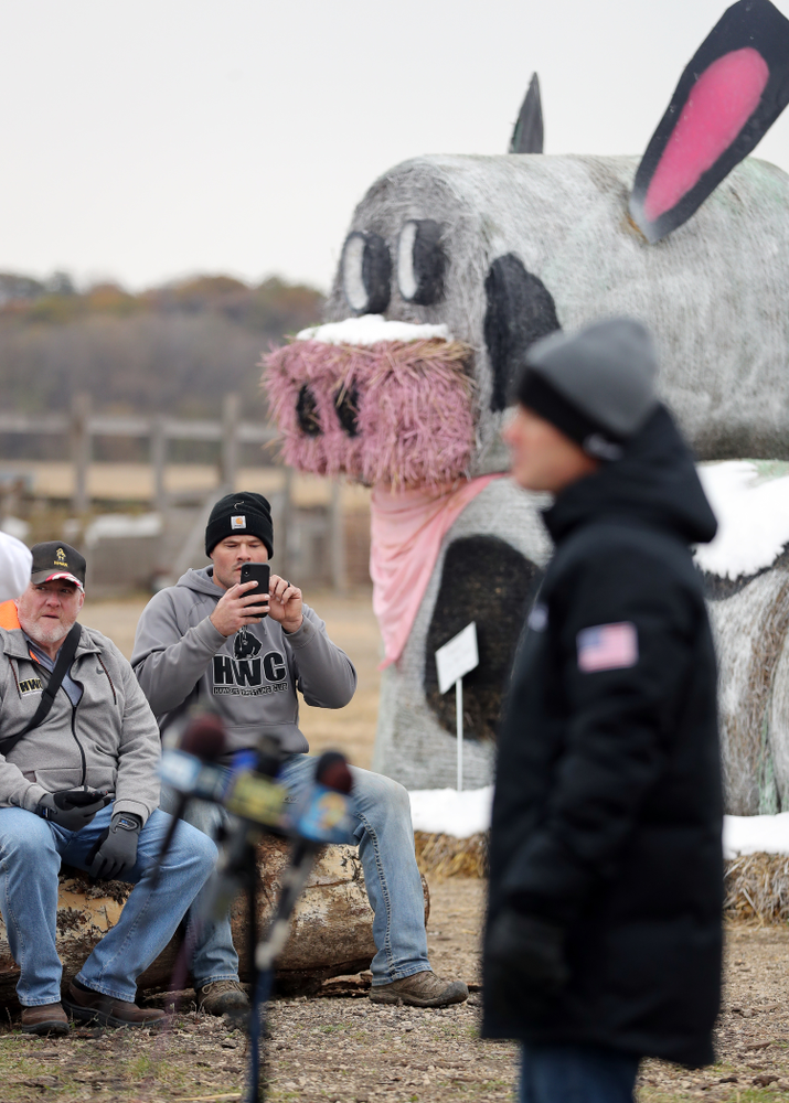 Former Hawkeye Football player and ANF honoree Matt Kroul listens as Iowa Wrestling Head Coach Tom Brands answers questions from reporters during the teamÕs annual media day Wednesday, October 30, 2019 at Kroul Family Farms in Mount Vernon. (Brian Ray/hawkeyesports.com)