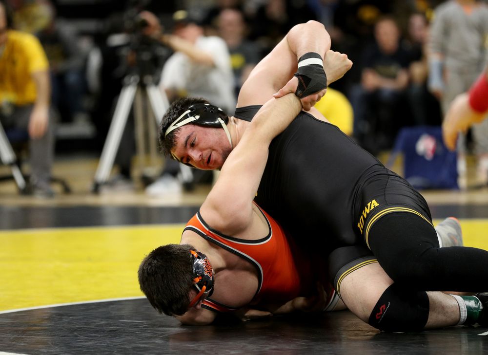 Iowa’s Tony Cassioppi wrestles Oklahoma State’s Auston Harris at heavyweight Sunday, February 23, 2020 at Carver-Hawkeye Arena. Cassioppi won the match 11-1. (Brian Ray/hawkeyesports.com)