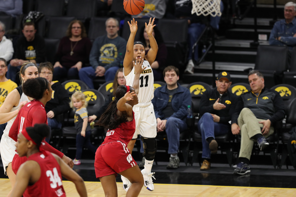 Iowa Hawkeyes guard Tania Davis (11) against the Wisconsin Badgers Monday, January 7, 2019 at Carver-Hawkeye Arena. (Brian Ray/hawkeyesports.com)