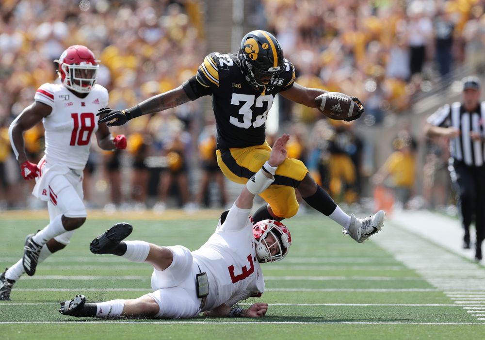 Iowa Hawkeyes linebacker Djimon Colbert (32) returns an interception against the Rutgers Scarlet Knights Saturday, September 7, 2019 at Kinnick Stadium. (Brian Ray/hawkeyesports.com)