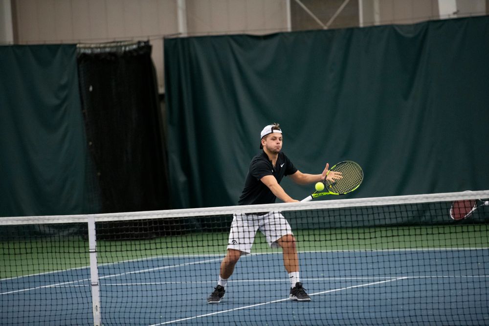 The Iowa men's tennis team competes against Cornell in The Rise Tennis Center in Ithaca, NY on Sunday, Feb. 24, 2019.