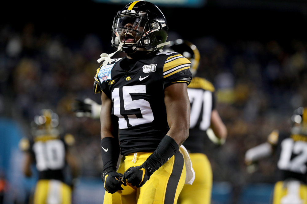Iowa Hawkeyes running back Tyler Goodson (15) celebrates a touchdown against USC in the Holiday Bowl Friday, December 27, 2019 at San Diego Community Credit Union Stadium. (Brian Ray/hawkeyesports.com)