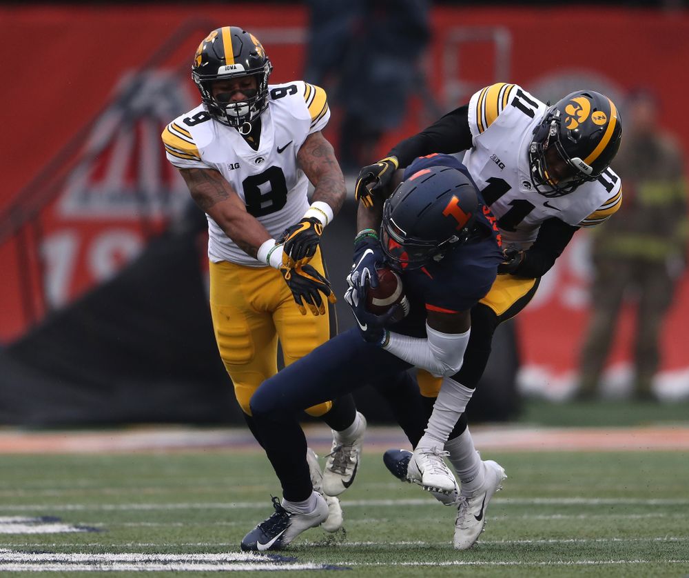 Iowa Hawkeyes defensive back Geno Stone (9) and defensive back Michael Ojemudia (11) against the Illinois Fighting Illini Saturday, November 17, 2018 at Memorial Stadium in Champaign, Ill. (Brian Ray/hawkeyesports.com)