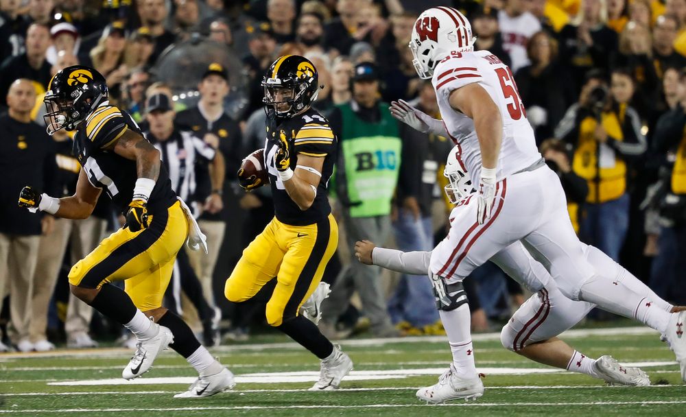 Iowa Hawkeyes wide receiver Kyle Groeneweg (14) runs the ball during a game against Wisconsin at Kinnick Stadium on September 22, 2018. (Tork Mason/hawkeyesports.com)