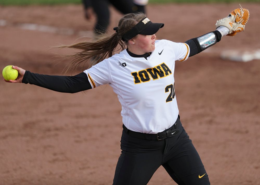 Iowa pitcher Miranda Schulte (20) delivers to the plate during the fifth inning of their game against Illinois at Pearl Field in Iowa City on Friday, Apr. 12, 2019. (Stephen Mally/hawkeyesports.com)