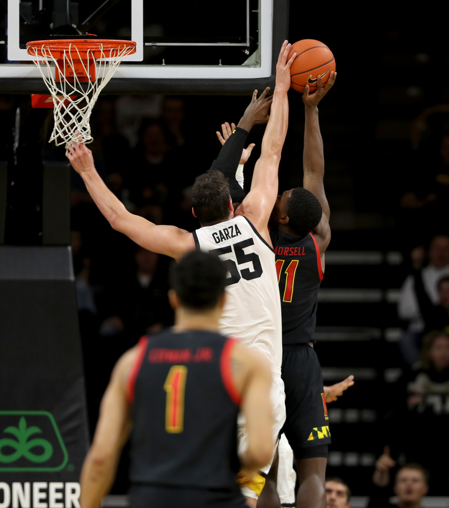Iowa Hawkeyes forward Luka Garza (55) blocks a shot against the Maryland Terrapins Friday, January 10, 2020 at Carver-Hawkeye Arena. (Brian Ray/hawkeyesports.com)