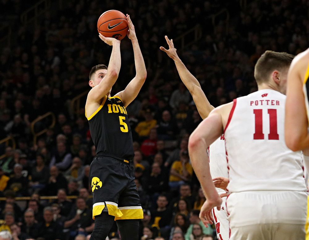 Iowa Hawkeyes guard CJ Fredrick (5) makes a basket during the second half of their game at Carver-Hawkeye Arena in Iowa City on Monday, January 27, 2020. (Stephen Mally/hawkeyesports.com)