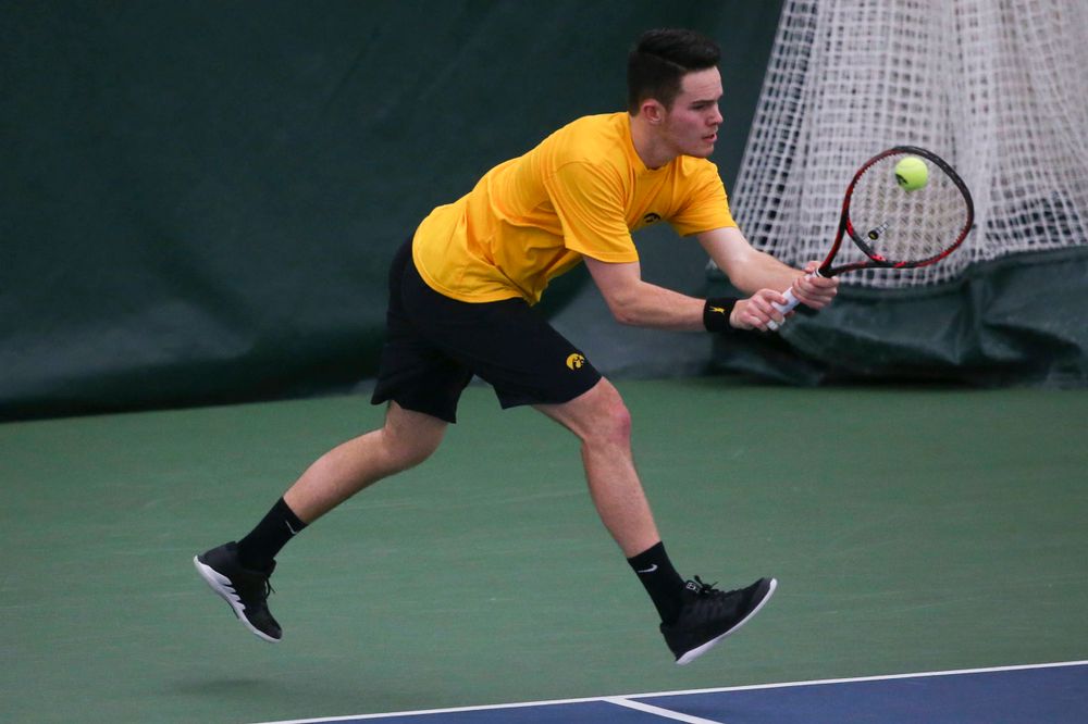 Iowa's Jonas Larsen at a tennis match vs Drake Friday, March 8, 2019 at the Hawkeye Tennis and Recreation Complex. (Lily Smith/hawkeyesports.com)