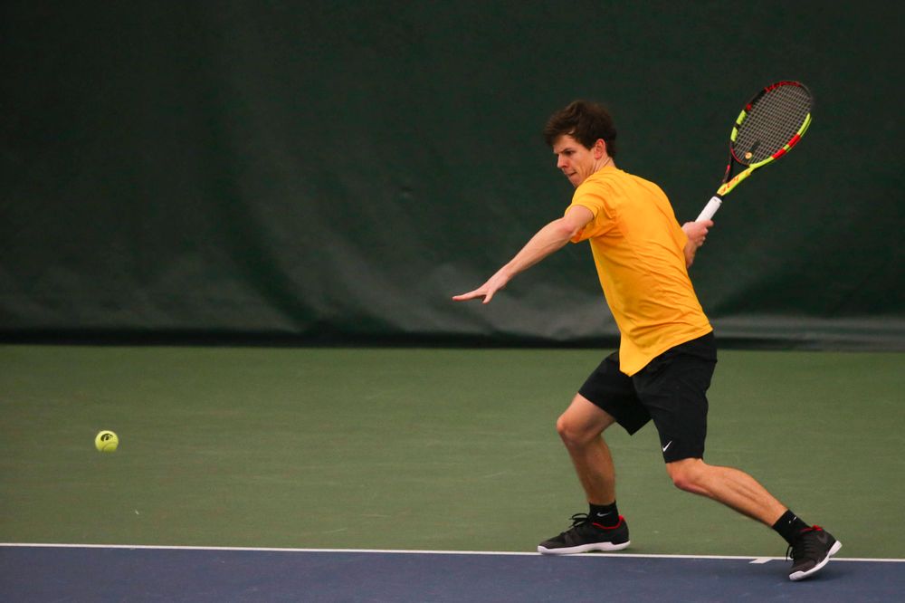 Iowa's Joe Tyler at a tennis match vs Drake Friday, March 8, 2019 at the Hawkeye Tennis and Recreation Complex. (Lily Smith/hawkeyesports.com)