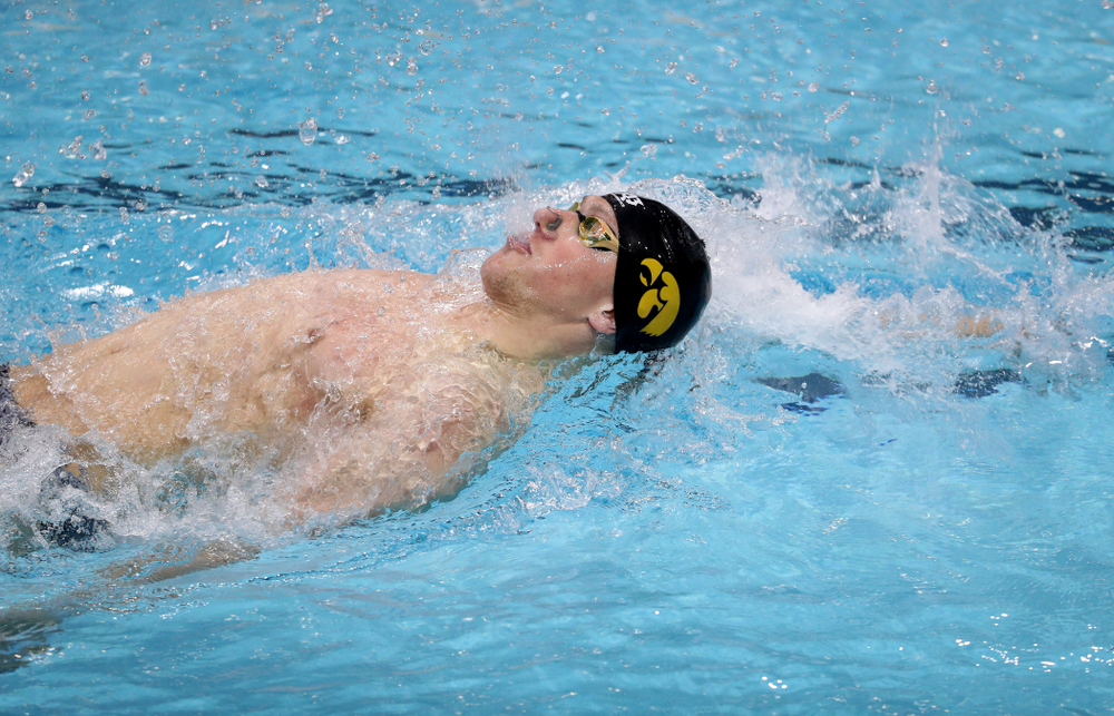 IowaÕs John Colin swims the backstroke leg of the 200 Medley Relay against Notre Dame and Illinois Saturday, January 11, 2020 at the Campus Recreation and Wellness Center. (Brian Ray/hawkeyesports.com)