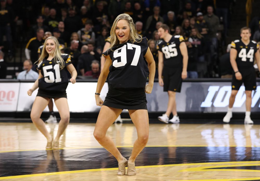 The Iowa Dance Team performs with the Iowa Football Team at halftime of the Iowa Hawkeyes game against the Indiana Hoosiers Friday, February 22, 2019 at Carver-Hawkeye Arena. (Brian Ray/hawkeyesports.com)