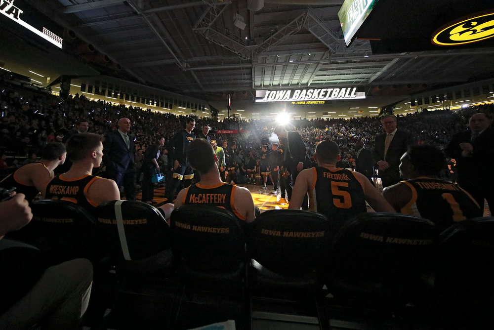 Iowa Hawkeyes center Luka Garza (55), guard Joe Wieskamp (10), guard Connor McCaffery (30), guard CJ Fredrick (5), and guard Joe Toussaint (1) wait to be introduced before their game at Carver-Hawkeye Arena in Iowa City on Monday, January 27, 2020. (Stephen Mally/hawkeyesports.com)