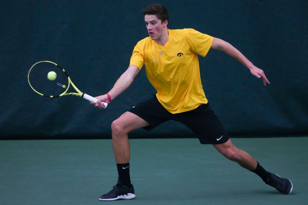 Iowa's Piotr Smietana at a tennis match vs Drake Friday, March 8, 2019 at the Hawkeye Tennis and Recreation Complex. (Lily Smith/hawkeyesports.com)