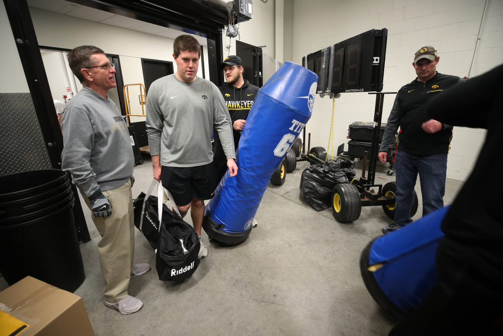 Members fo the Hawkeye Football equipment staff and managers load equipment onto the truck bound for Tampa for the Outback Bowl Wednesday, December 19, 2018 at the Hansen Football Performance Center. (Brian Ray/hawkeyesports.com)