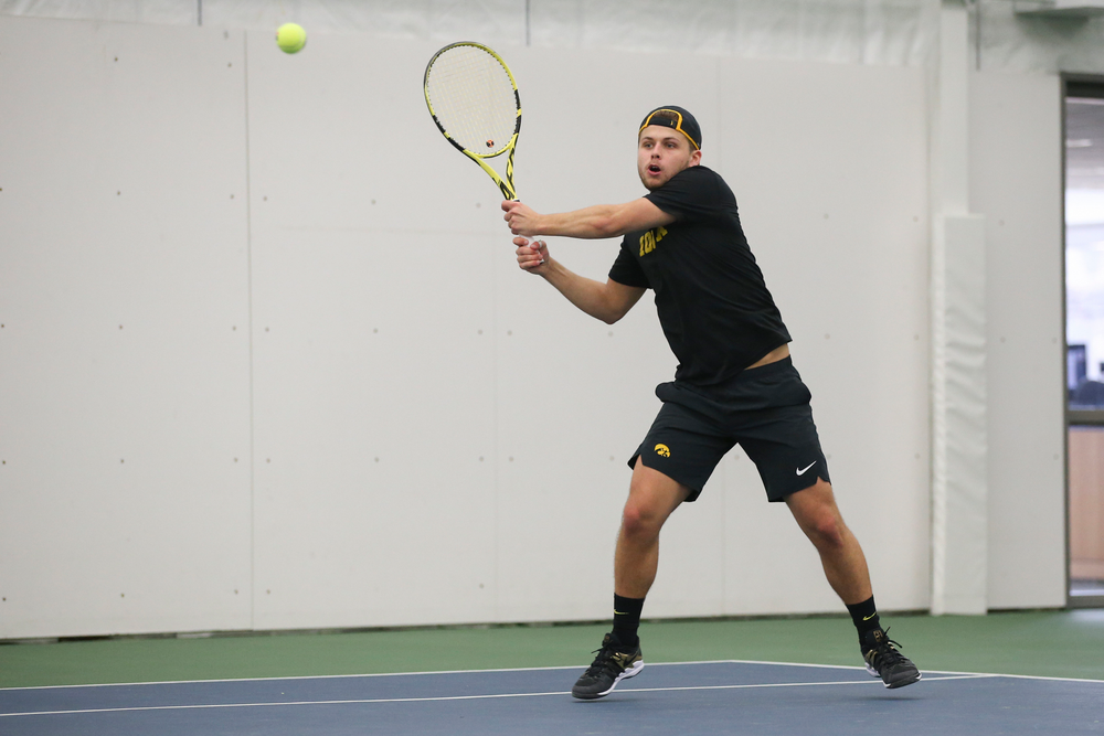 Iowa’s Will Davies returns a hit during the Iowa men’s tennis meet vs VCU on Saturday, February 29, 2020 at the Hawkeye Tennis and Recreation Complex. (Lily Smith/hawkeyesports.com)