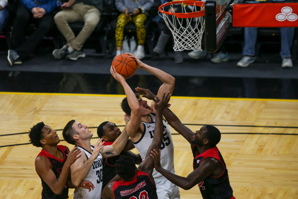 Iowa Hawkeyes center Luka Garza (55) and Iowa Hawkeyes guard Connor McCaffery (30) during Iowa men’s basketball vs SIUE on Friday, November 8, 2019 at Carver-Hawkeye Arena. (Lily Smith/hawkeyesports.com)
