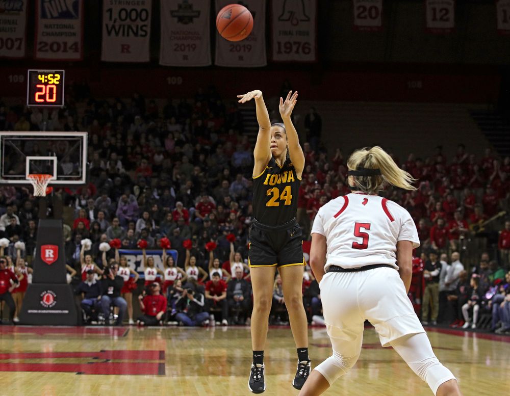 Iowa guard Gabbie Marshall (24) makes a 3-pointer during the first quarter of their game at the Rutgers Athletic Center in Piscataway, N.J. on Sunday, March 1, 2020. (Stephen Mally/hawkeyesports.com)